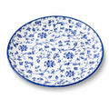 Piatto piano rotondo 27 cm in ceramica bianco e blu con motivo floreale